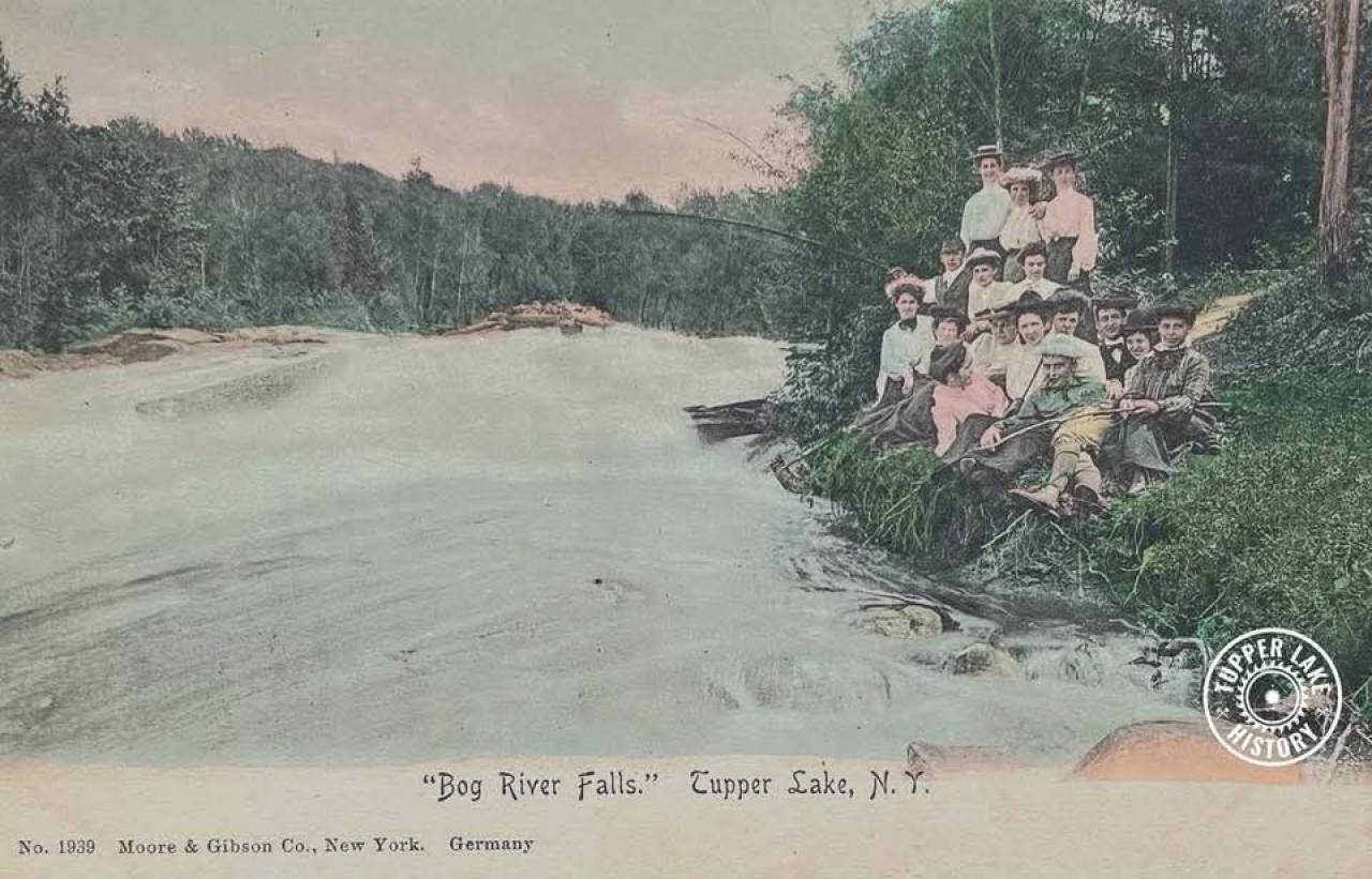 A group of guys near Bog River Falls on a postcard, provided by Tupper Lake History